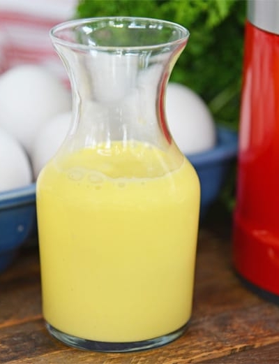 glass jar of hollandaise